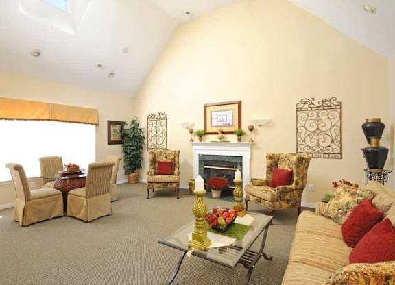 A living room with a fireplace and a couch.