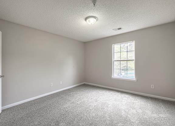 Bedroom With Plenty Of Natural Lights at Cross Creek Apartments, Beaufort, SC