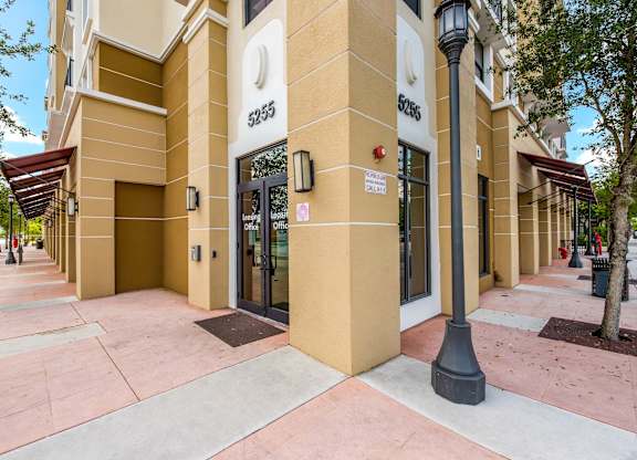 The image shows a building with the numbers 5255 and 5265 on it.