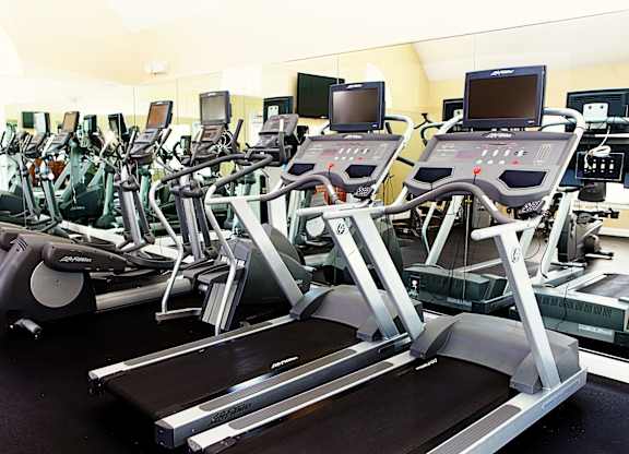 A row of treadmills in a gym.at Summerland Heights, Woodbridge  