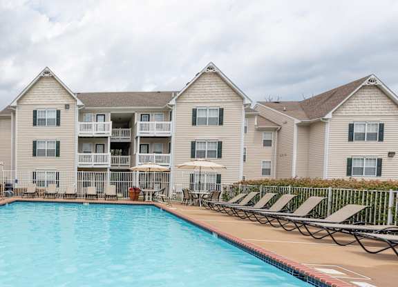A large swimming pool in front of apartment buildings.at Summerland Heights, Woodbridge Virginia  
