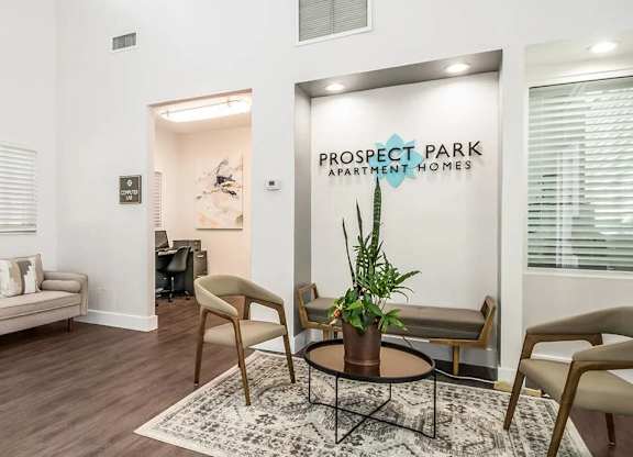A room with a sign that says "Prospect Park Apartment Homes".