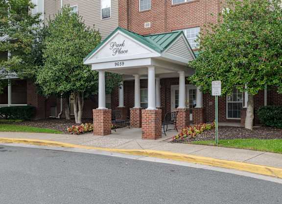 A building with a sign that says Park Place 9659.