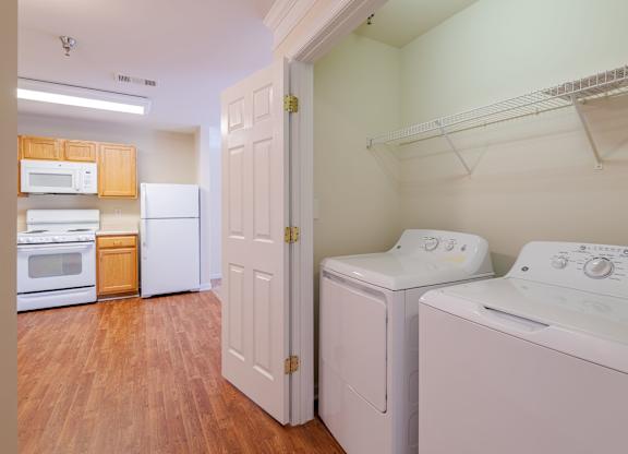 A laundry room with a washer and dryer.at The Gardens of Stafford, 22193  