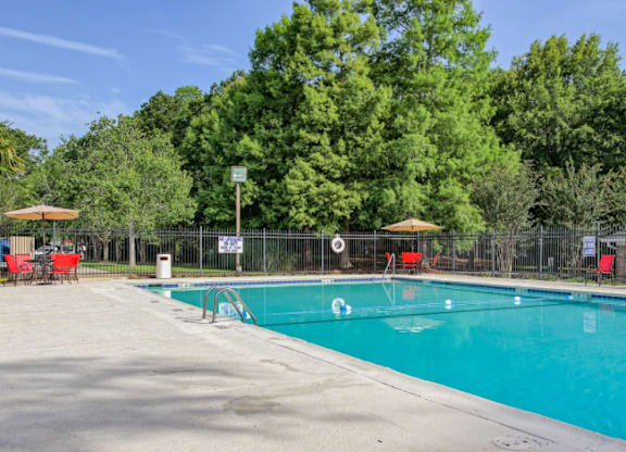 Swimming pool with a fence at Gates at Summerville, Summerville, South Carolina