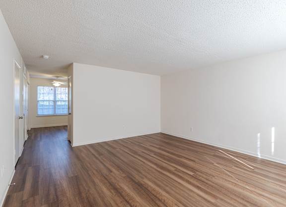 A room with wooden floors and white walls.at The Village at England Run, 22406  