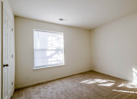 Carpeted Bedroom at Woodwind Villa Apartments, Woodbridge