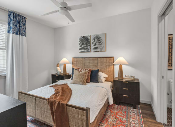 a bedroom with a bed and a ceiling fan at Casa Marti, 33605
