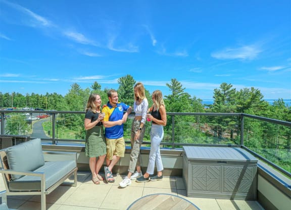 a group of people standing on a balconyat Bluestone Lofts, Duluth, MN