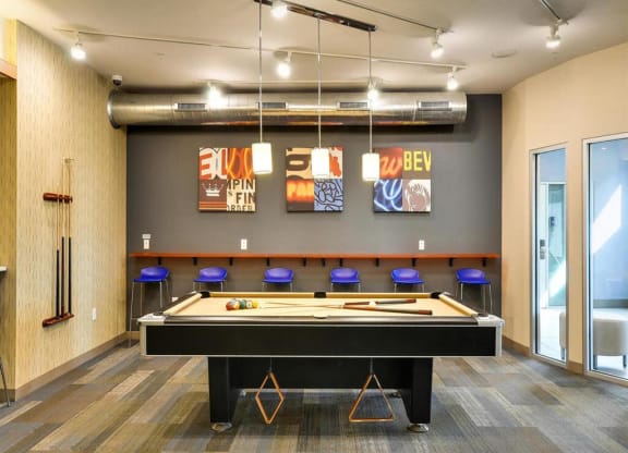 a game room with a pool table at Bluestone Lofts, Duluth, MN 55803