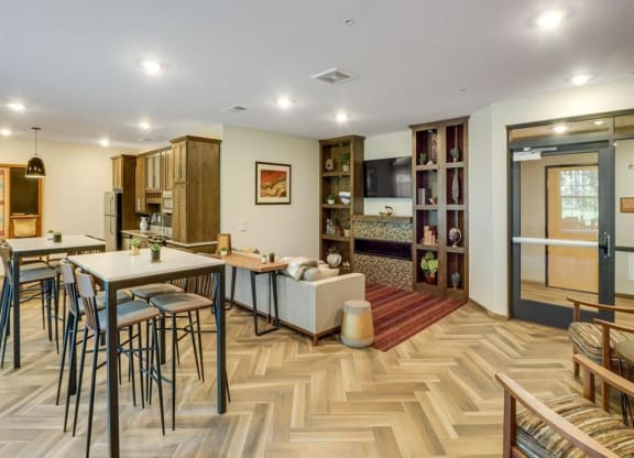 a kitchen and dining room with a table and chairs at Arbor Ridge, Minnesota