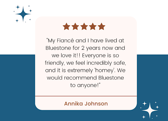 A resident review from Annika Johnson praises Bluestone Flats for its friendly and safe environment.