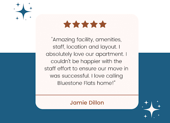 A resident review for BlueStone Flats is displayed, with a five-star rating and a positive testimonial from Jamie Dillon.