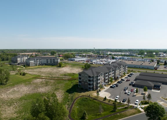 an aerial view of an apartment complex in a city  at Timber Ridge, Forest Lake, MN