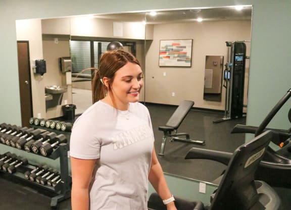 a woman on a treadmill at the gym  at Timber Ridge, Minnesota