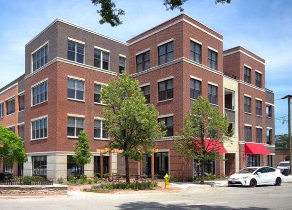 a large brick building on the corner of a street at Clarendon Hills 229, Clarendon, 60514