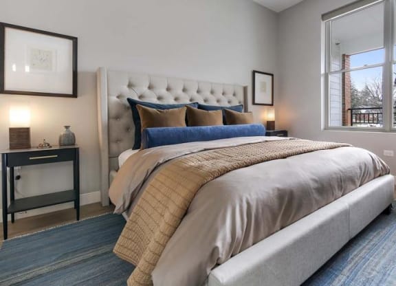 a bedroom with a bed and a large window at Clarendon Hills 229, Clarendon Illinois