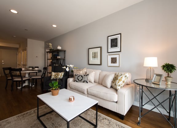 a living room with a couch and a table