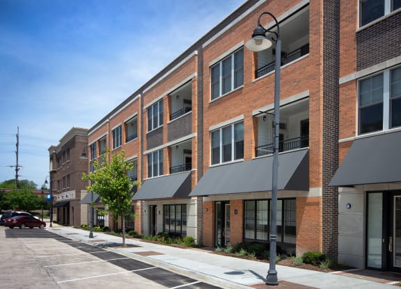 a brick building with a street light in front of it at Clarendon Hills 229, Illinois