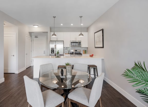 a kitchen and dining room with a glass table at Barrington 101, Barrington, 60010