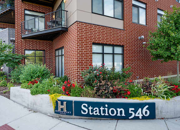 A brick building with a sign that says Station 546.