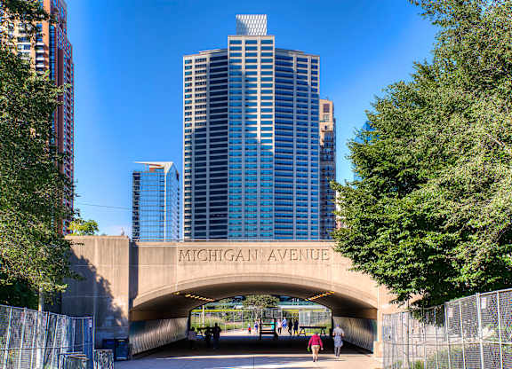 A concrete archway with the words