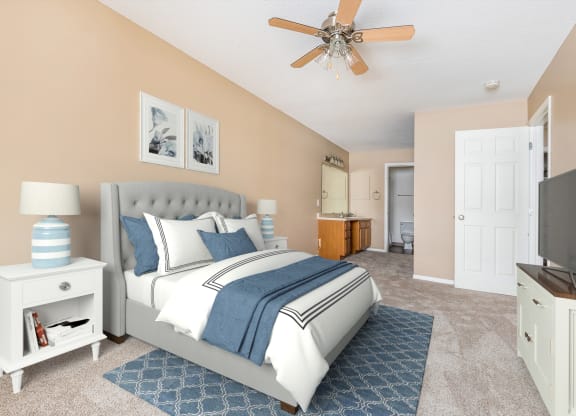 a bedroom with a bed and a ceiling fan at Heritage Hills Apartments, Bloomington, MN, 55437