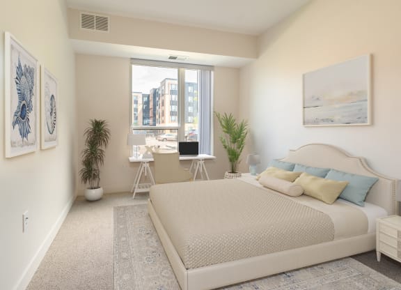 a bedroom with a bed and a window