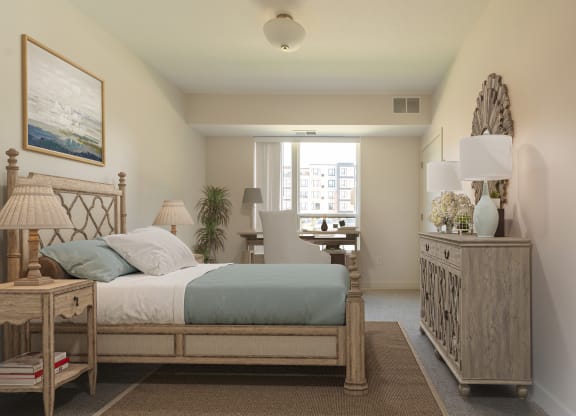 a bedroom with a bed and a dresser