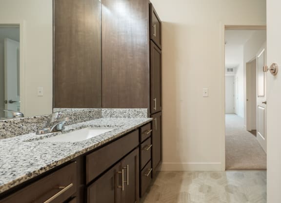a bathroom at homewood suites by hilton houston stafford sugar land
