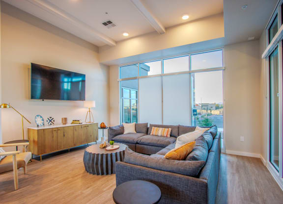 a living room with a couch and a tv