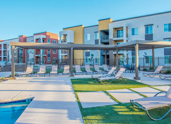 our apartments have a large pool and lounge chairs