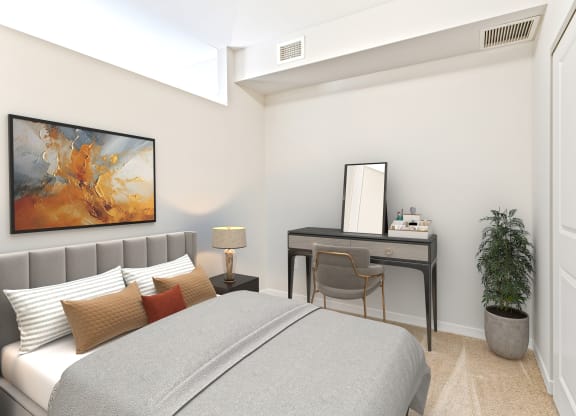 a bedroom with a bed and a desk at EastGate Apartments, Rochester, Minnesota