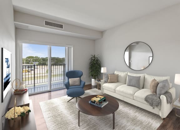 a living room with a couch and a coffee table at EastGate Apartments, Minnesota