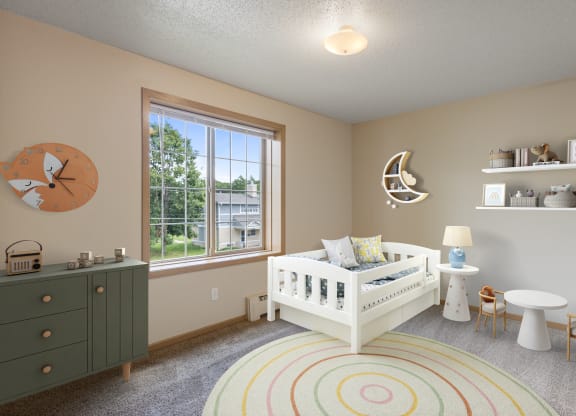 a nursery with a crib and a dresser and a window at Ames Lake Neighborhood Apartments, St. Paul, MN