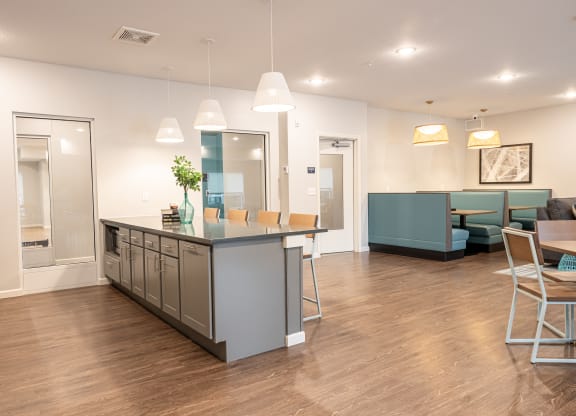 Clubroom kitchen island with barstools