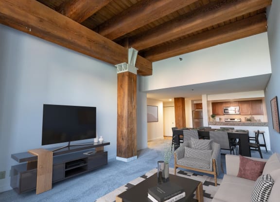 a living room with a couch and a tv
