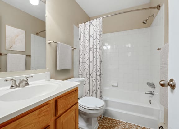 Bathroom With Bathtub at Northtown Village Apartments, Spring Lake Park, MN