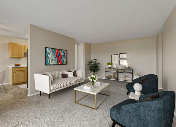 a living room with a couch and chairs and a coffee table at Northtown Village Apartments, Spring Lake Park, 55432-2650