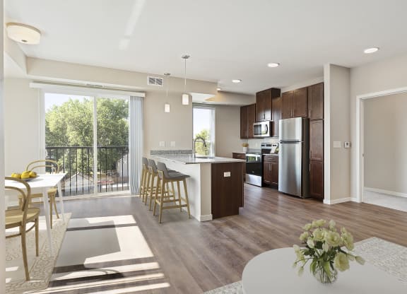 Living Room With Kitchen at The Quill 55+ Apartments, Minnesota