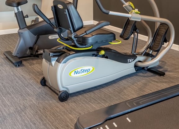 a workout room with exercise equipment at the inn at the crossroads