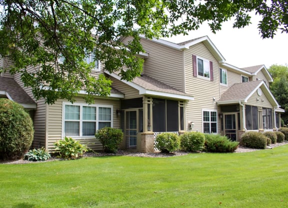 exterior of townhomes with beautiful landscaping