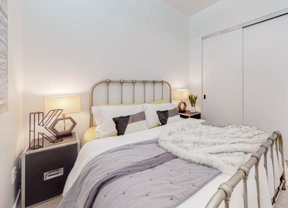 Cozy bed at CityLine Apartments, Minneapolis, Minnesota