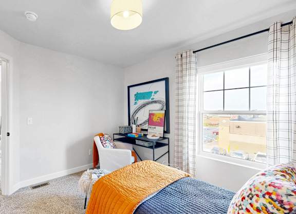 Bedroom With A Desk at Field and Grove Townhomes of Champlin, Champlin, MN
