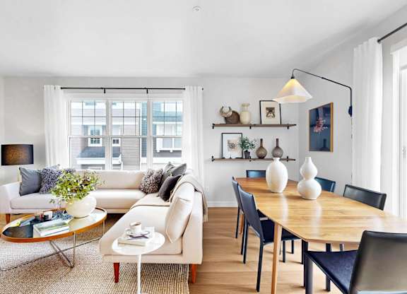 Dining Area With Living at Field and Grove Townhomes of Champlin, Minnesota