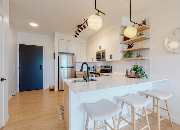 Kitchen with counter table at CityLine Apartments, Minneapolis, MN