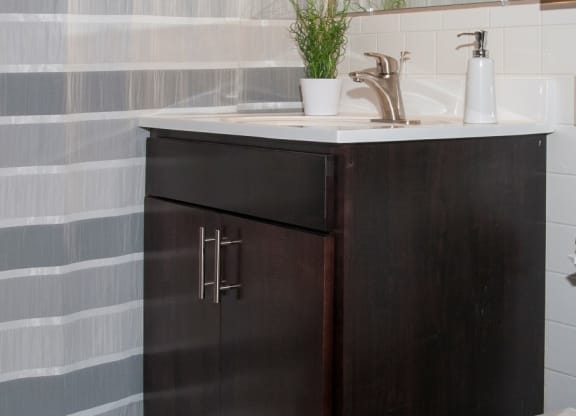 624 Huron Boulevard Apartment White Tile Bathroom with Tall Shower