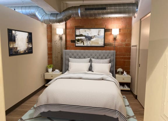 Spacious Bedroom With Comfortable Bed at 700 Central Apartments, MN, 55414