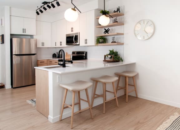 Fitted Kitchen With Island Dining at CityLine Apartments, Minneapolis, 55406