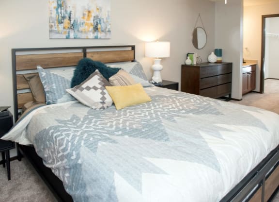 Master bedroom with walk-in closet and sink, Aspenwoods Apartments, Eagan, MN